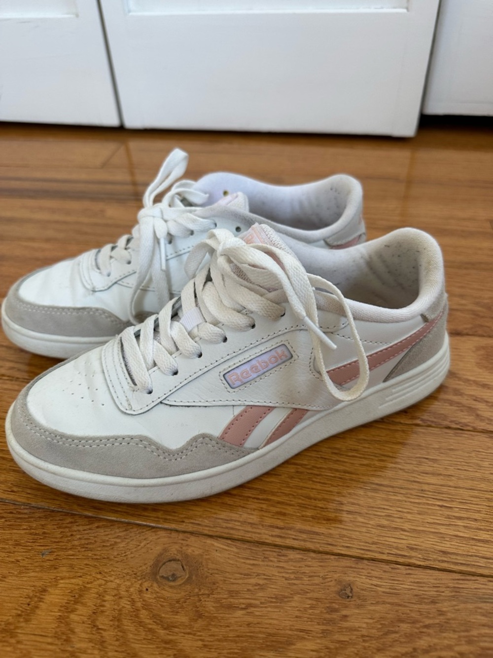 Reebok White Sneakers with Pink Stripe Accents